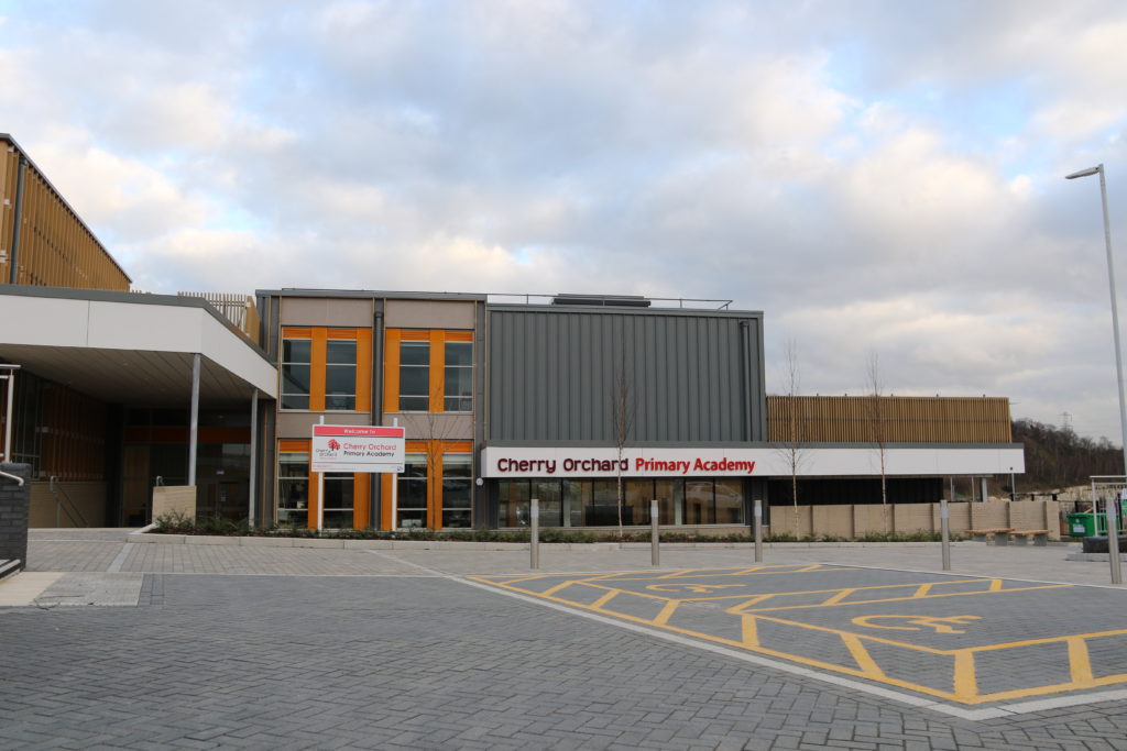 Photo of the exterior of the Cherry Orchard Primary Academy building.